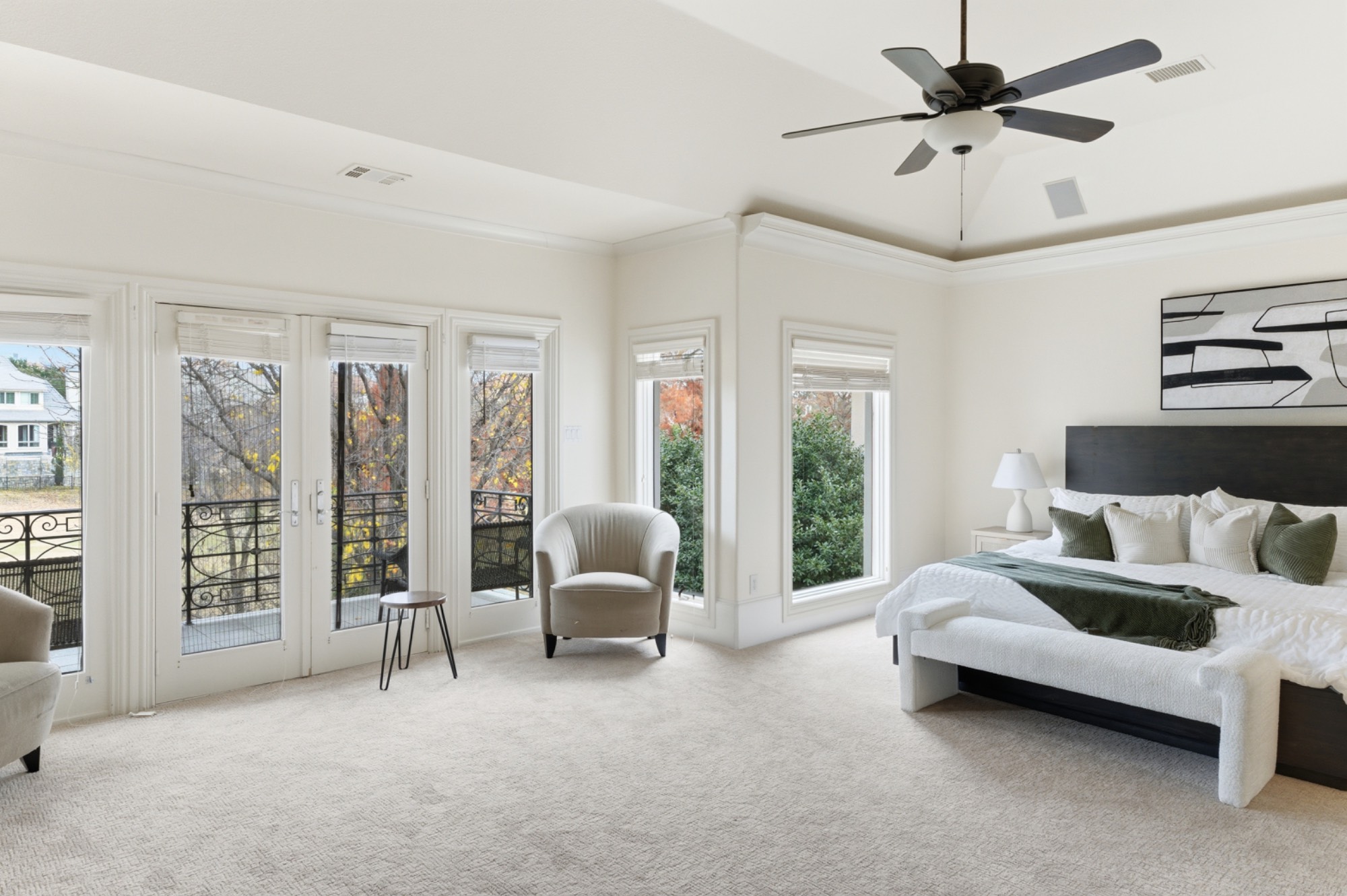 Upstairs primary suite with balcony access