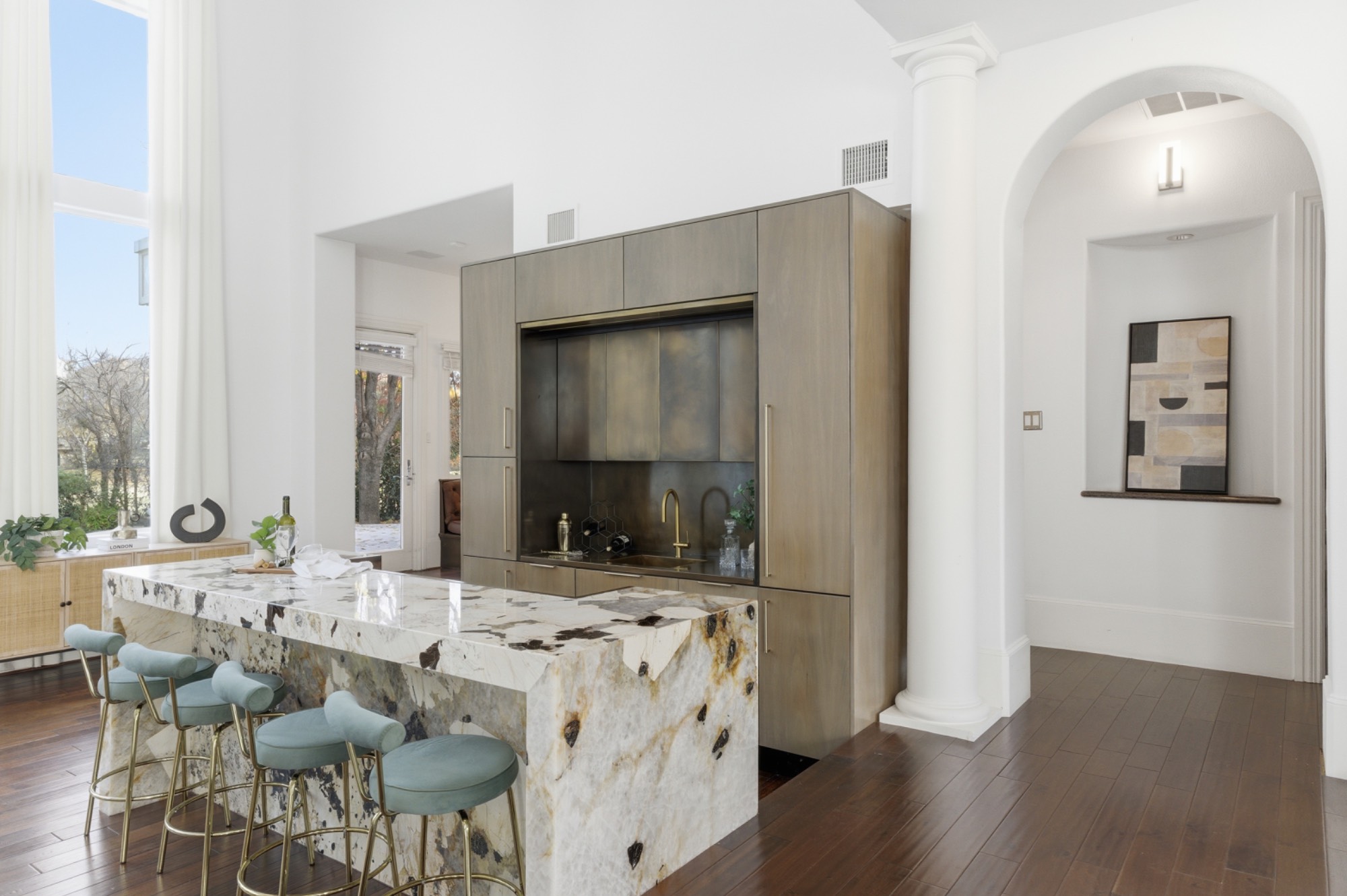 Designer wet bar with Patagonia granite waterfall island